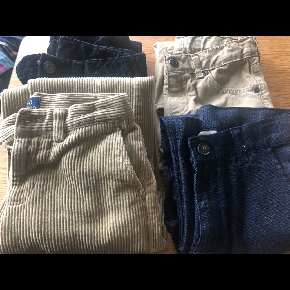 Four pants of boy size 7 sold as a set